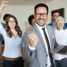 A team cheering together with evident enthusiasm.