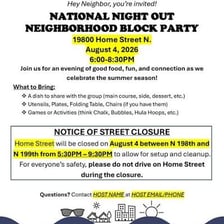 A neighborhood block party taking place along a residential street.