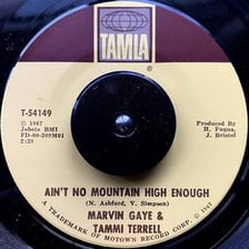 A vintage record associated with the song “Ain't No Mountain High Enough”