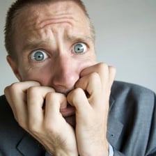 A person appearing worried and tense