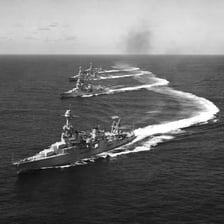 A formation of naval warships at sea
