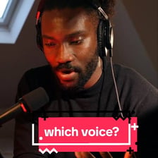 A person speaking into a microphone