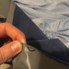 A visible puncture in the surface of an inflatable air mattress