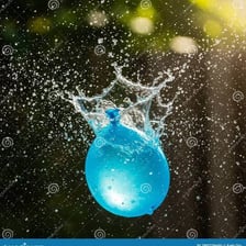 A water balloon bursting into a splash