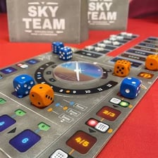 Sky Team board game components depicting a cockpit and flight controls.