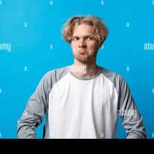 Person making a mildly disappointed reaction