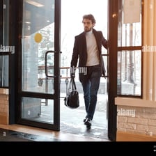 A person entering a building