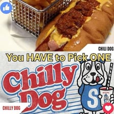 Hot dogs covered with chili and toppings