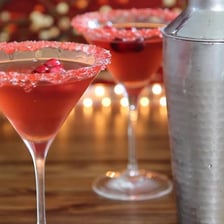 A red cranberry martini in a cocktail glass