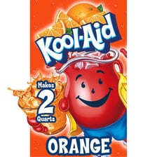 A pitcher of Kool-Aid beside packets of the drink mix.