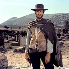 A lone cowboy separated from a group
