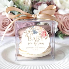A baby shower decorated with gifts and celebratory items
