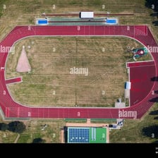 An oval running track viewed from above.