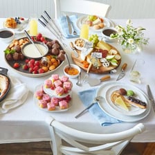 A brunch meal with breakfast and lunch foods