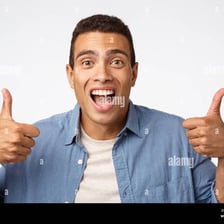 A person giving a thumbs-up gesture to express approval