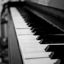 A close-up of dark ebony piano keys on a keyboard.