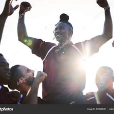 A victorious athlete celebrating after winning a competition.