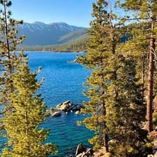 A clear blue alpine lake surrounded by mountains near Incline Village.