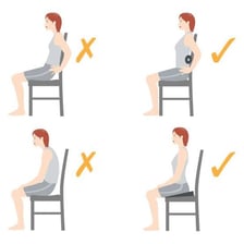 A person demonstrating an upright seated posture instead of slouching