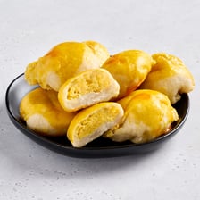 Filipino hopia pastries with flaky pastry shells and sweet filling.