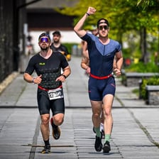 A triathlete running during the final leg of a race.
