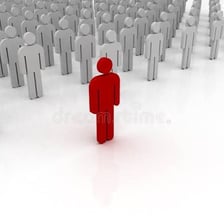 A reserved person standing apart from a social crowd.