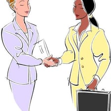 Two people meeting and shaking hands