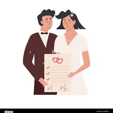 A couple signing a legal document before marriage
