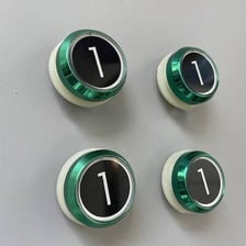 An elevator control panel with a first-floor button