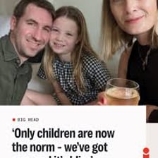 A family portrait showing one child with no siblings.