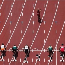 A runner beginning before the official starting signal, illustrating a false start.