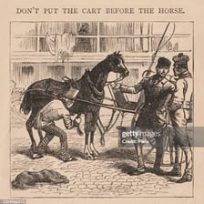 An illustration showing a cart positioned before the horse pulling it.