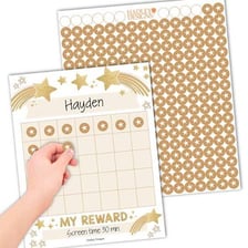 A gold star sticker attached to a graded school paper