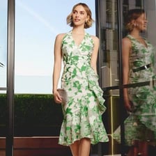 A dress with a fitted bodice and skirt widening toward the hem