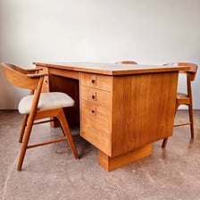 Teak wood used in an outdoor deck and a wooden desk.