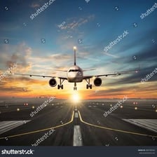 An airplane touching down on an airport runway.
