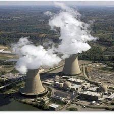 An electric power plant with large cooling towers.