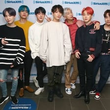 The members of the South Korean pop group BTS posing together