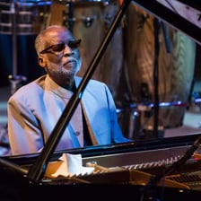 Ahmad Jamal performing at a piano