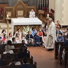 A Catholic congregation receiving Holy Communion during Mass
