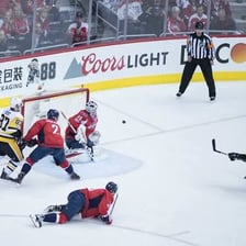 Players competing in a National Hockey League ice hockey game