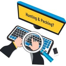 A person searching for individual keys while typing on a keyboard.