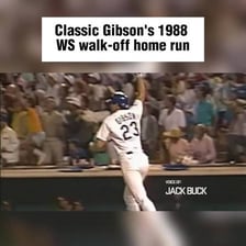 A baseball player jogging around the bases after hitting a home run