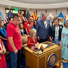 An official signing ceremony for new legislation.