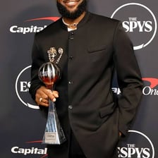 An ESPY Awards trophy at a sports awards ceremony.