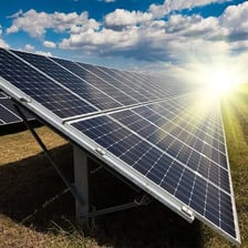 A solar panel receiving sunlight to generate renewable energy