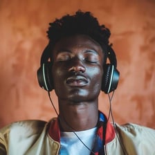 A person enjoying music through headphones