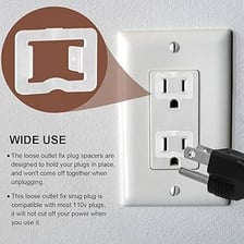 An electrical plug inserted into a wall socket