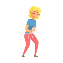 A person looking ill and holding their stomach.