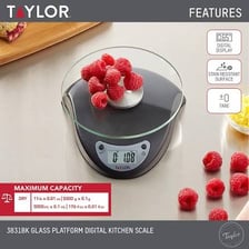 A digital kitchen scale with a visible tare button.